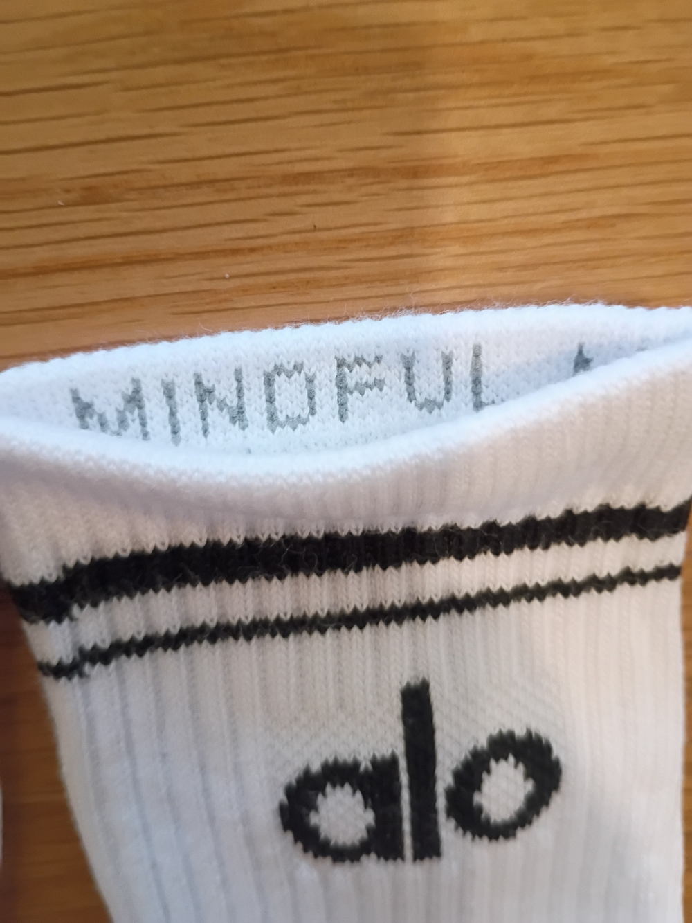 ALO Yoga White half Crew Athletic Socks with Black Logo - Picture 2 of 3